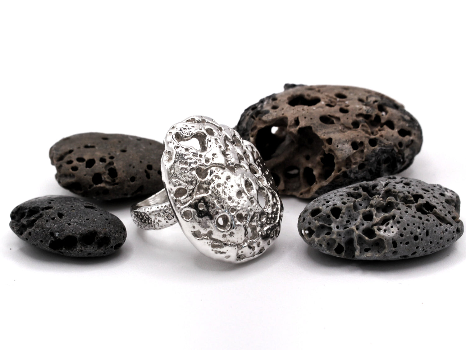Piedra Collection by Naturalesa Jewelry handmade recycled silver jewelry inspired by Mediterranean sea stones, celebrating imperfection, transformation, and natural beauty. Nature inspired jewelry made in Spain.