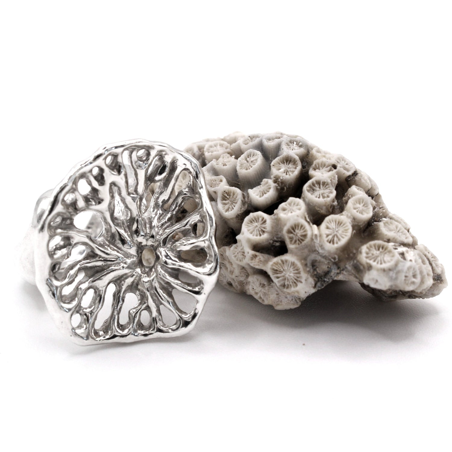 Flow Collection by Naturalesa Jewelry, handmade recycled silver jewelry inspired by mushroom coral, symbolizing movement, adaptability, and transformation. Recycled sterling silver jewelry inspired by coral forms.
