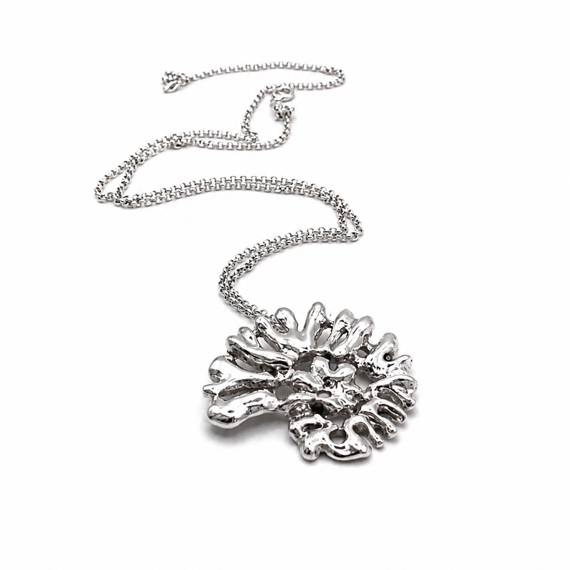 Souvenirs Espiral statement pendant in recycled sterling silver inspired by spiral shells and Mediterranean sea forms