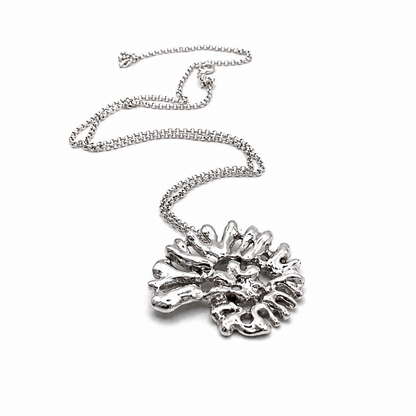 Souvenirs Espiral statement pendant in recycled sterling silver inspired by spiral shells and Mediterranean sea forms