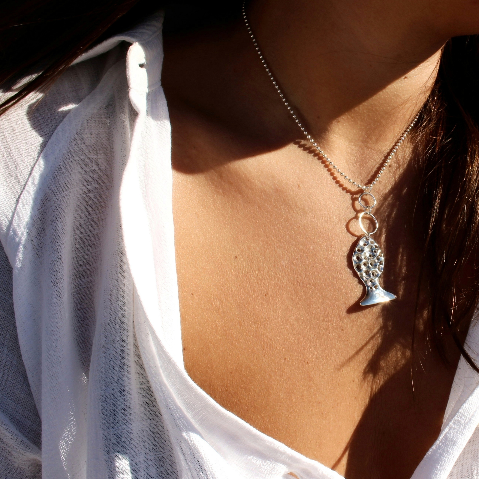 Sterling silver fish pendant, handcrafted using the lost wax casting technique. Unique Mediterranean-inspired jewelry, perfect for ocean lovers and sustainable fashion enthusiasts. Ethical and nature-inspired design, capturing the beauty of marine life in recycled silver