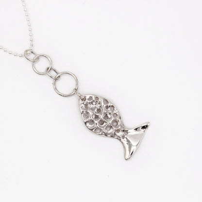 Mediterranean silver necklace with organic fish pendant symbolizing guidance and protection by Naturalesa Jewelry