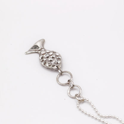 Sterling silver fish pendant, handcrafted using the lost wax casting technique. Unique Mediterranean-inspired jewelry, perfect for ocean lovers and sustainable fashion enthusiasts. Ethical and nature-inspired design, capturing the beauty of marine life in recycled silver